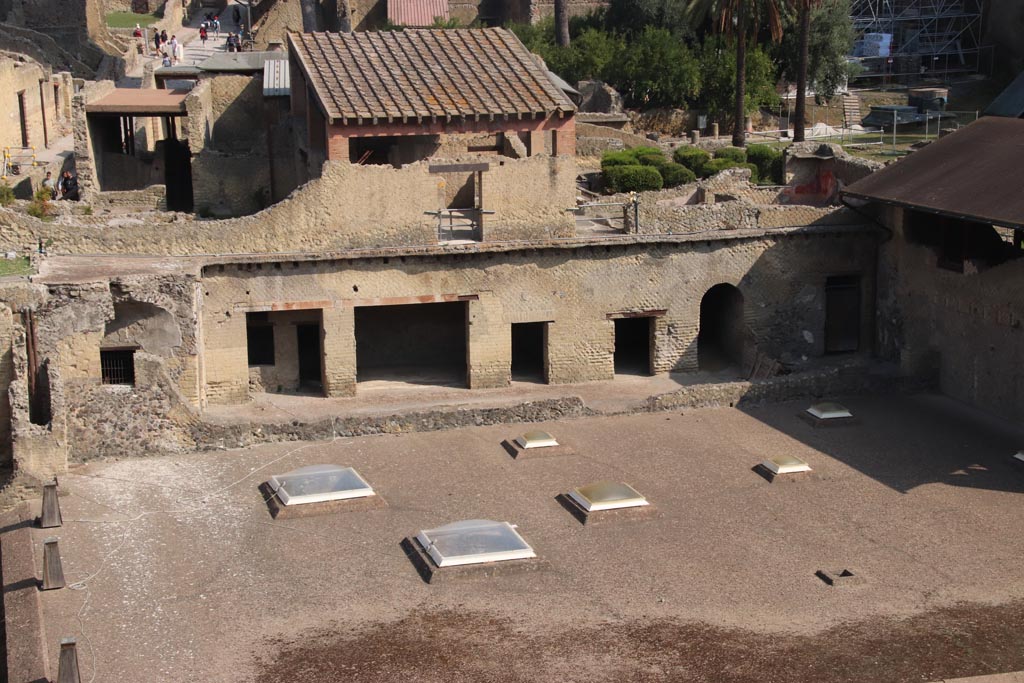 Ins. Or. I.1a, Herculaneum. October 2023.
Looking north from access roadway towards lower floor rooms opening south onto a vaulted corridor. Photo courtesy of Klaus Heese.
